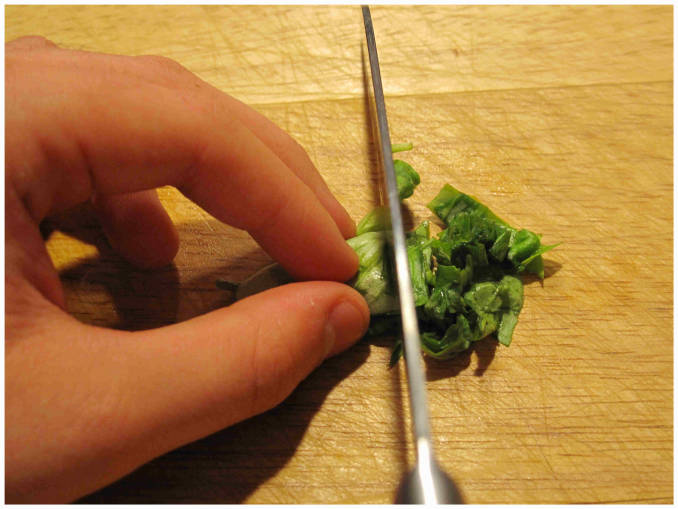 Chopping fresh basil