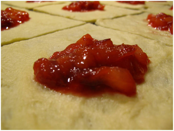 A plum-vanilla filling in danish dough-squares