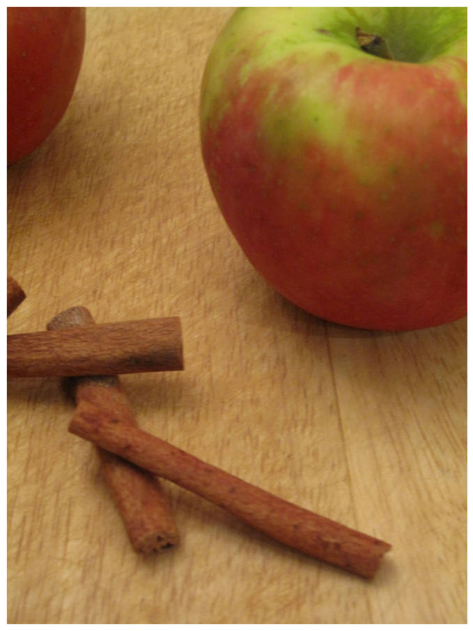 Apples and cinnamon sticks