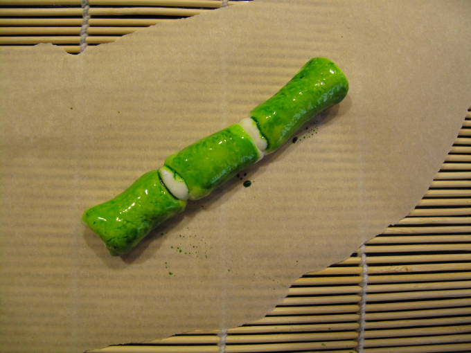 Painting green on the bamboo fondant