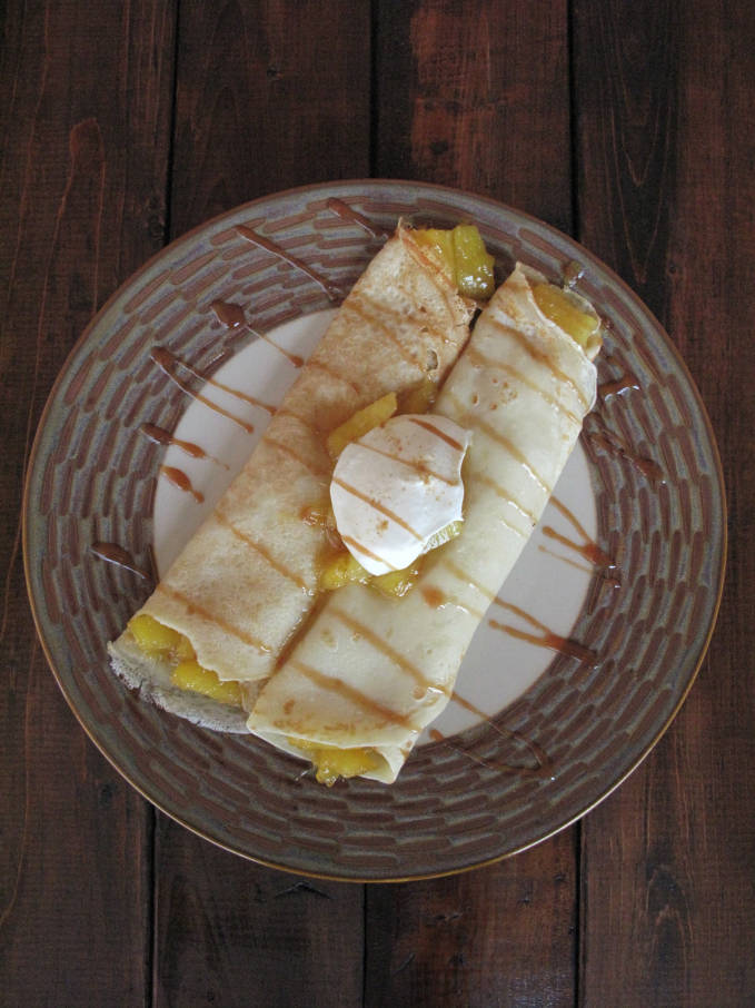 Pineapple-ginger crepes with honey and orange