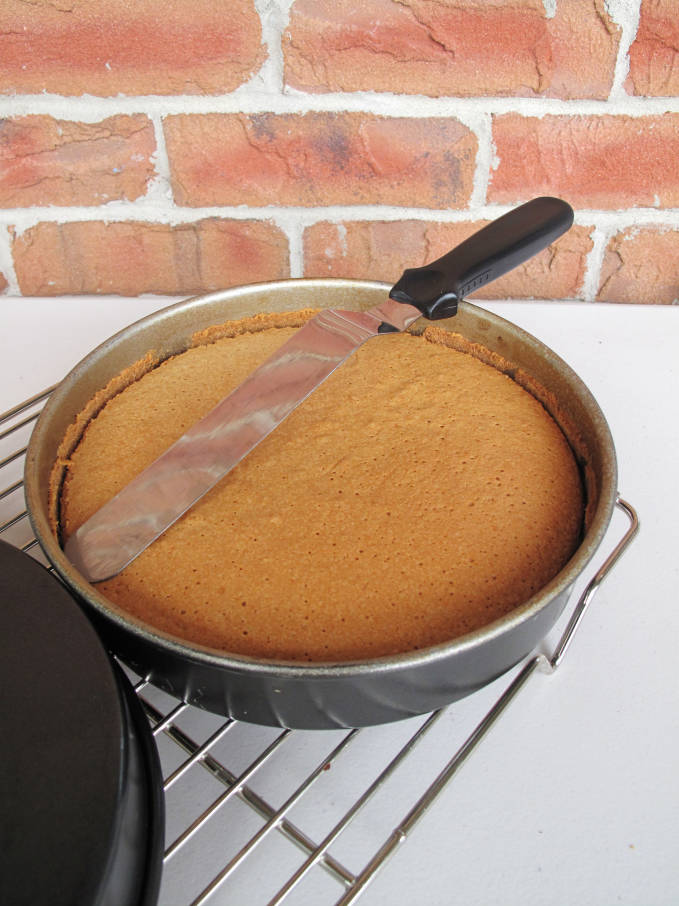 Remove the cake from the pan with an angled spatula or a knife