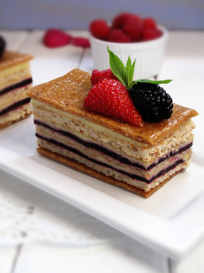 Raspberry hazelnut torte with vanilla-chive pastry cream, hazelnut dacquoise, and hazelnut nougatine