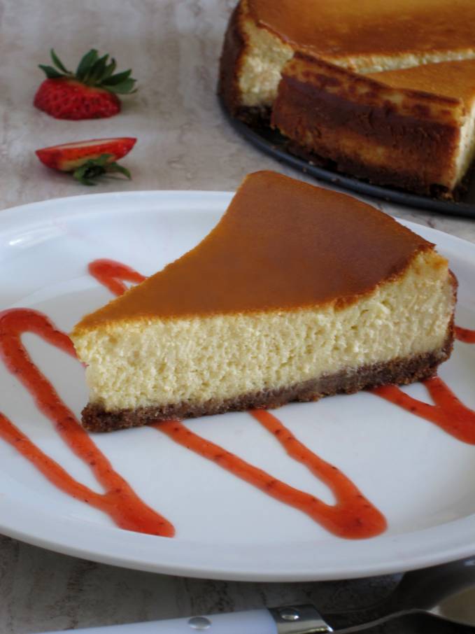 New York cheesecake with strawberry sauce