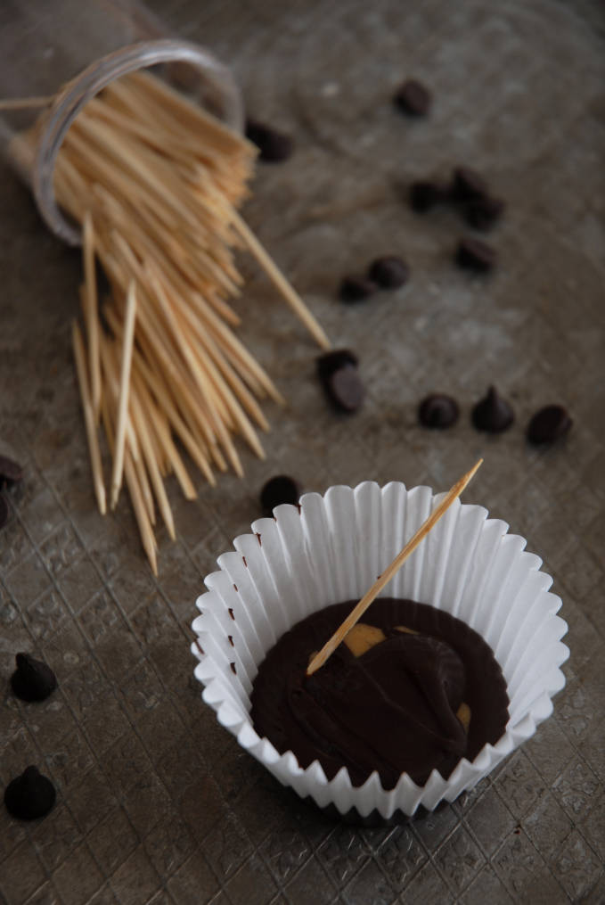 Covering any visible peanut butter with chocolate for homemade peanut butter cups. Click for the recipe!