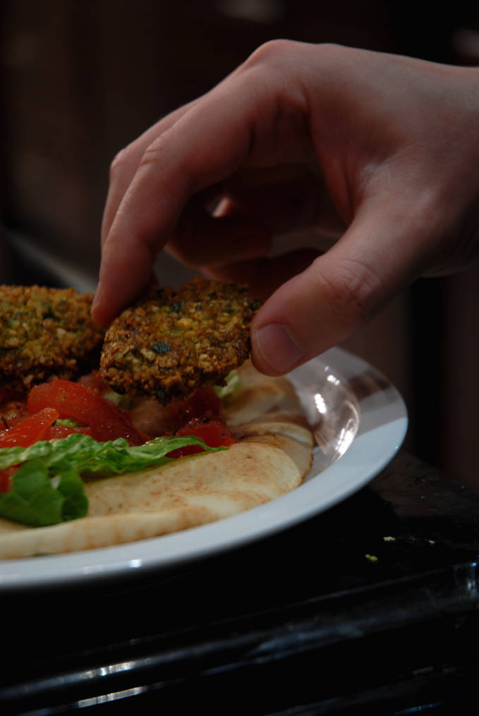 Chickpea falafel on a pita with vegetables. Click for the recipe!