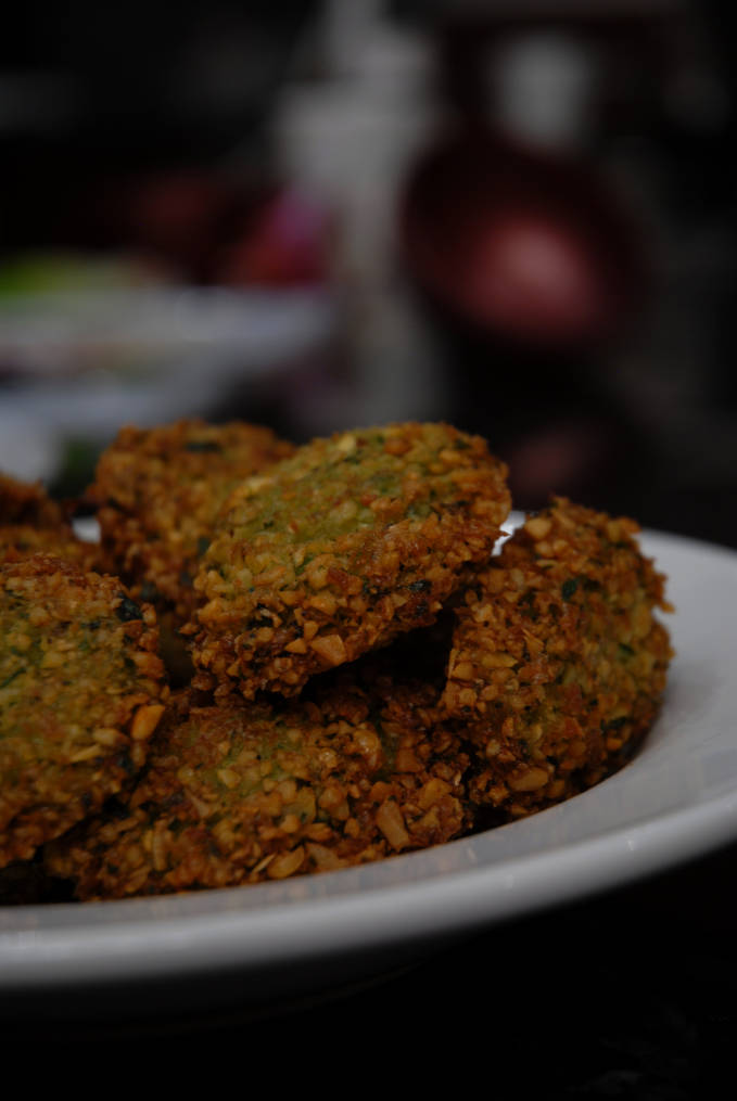 Homemade chickpea falafel with cilantro and parsley. Click for the scrumptious recipe!