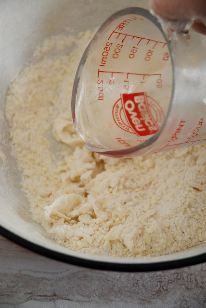 Adding water to tart dough--click to get instructions on how to make PERFECT PIE & TART DOUGH every time!