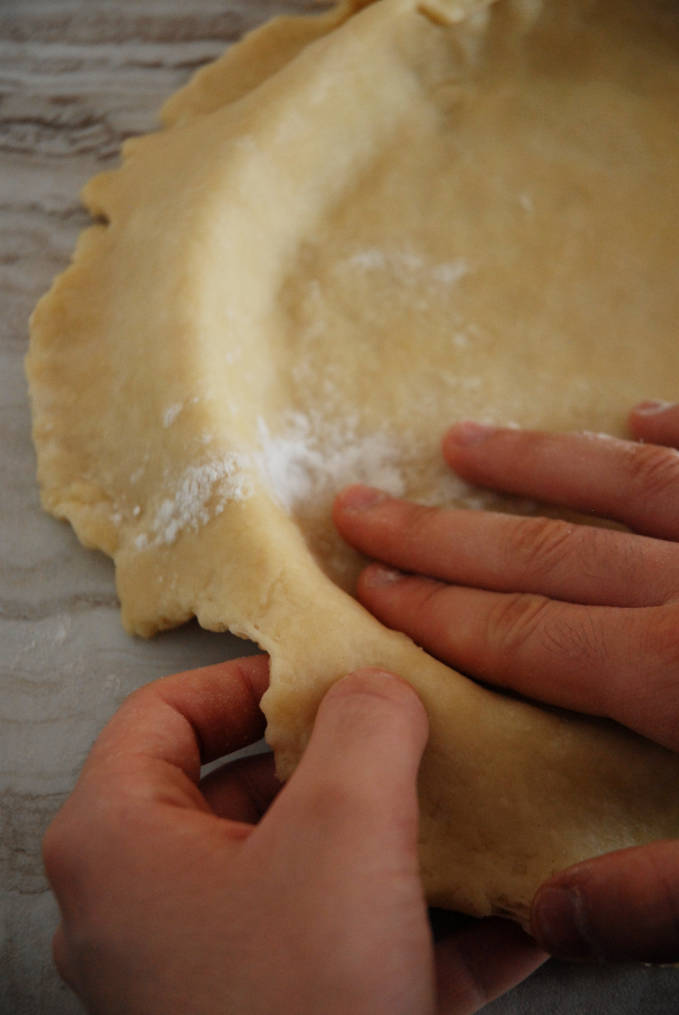 Pressing tart dough into pan--click to get instructions on how to make PERFECT PIE & TART DOUGH every time!