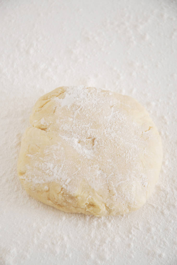 Chilled pie dough on a lightly floured work surface--click to get a step-by-step photo tutorial on lattice pie crusts, so you can make them easily!