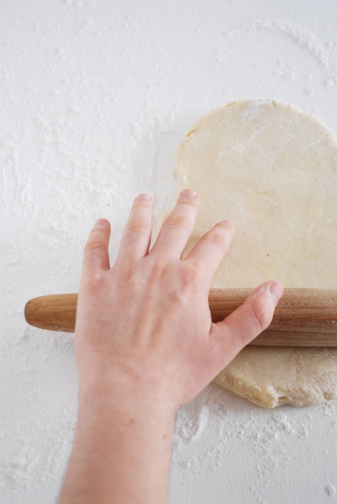 Rolling out pie dough--click to get a step-by-step photo tutorial on lattice pie crusts, so you can make them easily!