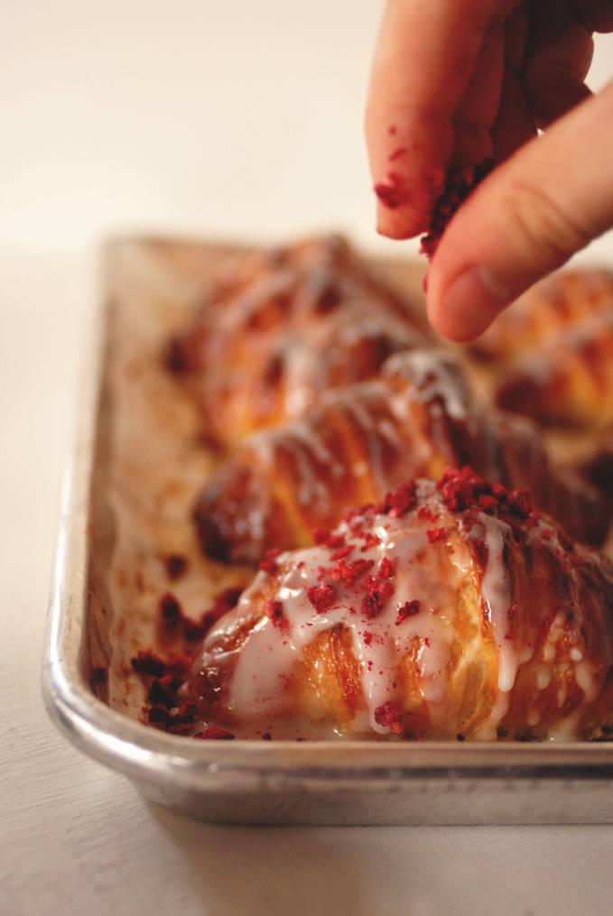 Regular croissants are boring. Try making these instead, with a raspberry and lychee filling. Here, I'm sprinkling freeze dried raspberries over the Ispahan croissants. Click for the recipe!