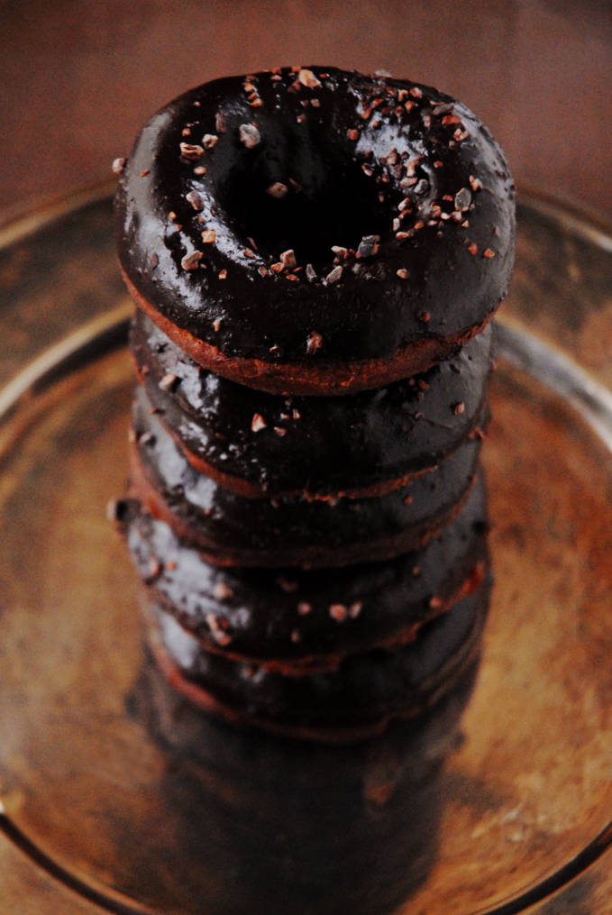 A stack of triple chocolate doughnuts sprinkled with cocoa nibs. Decadent, and pretty easy! Click to get the recipe.