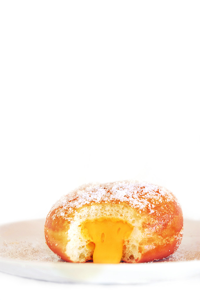 Oozing mango vanilla doughnuts are exceptionally tasty, light, and fluffy! Click to get the recipe.