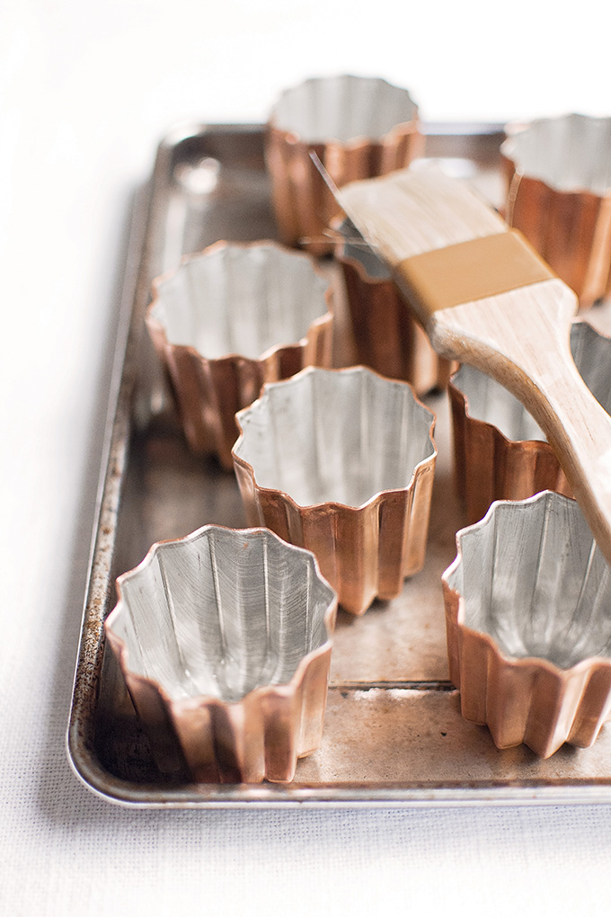 Prepping copper canelé moulds before first use