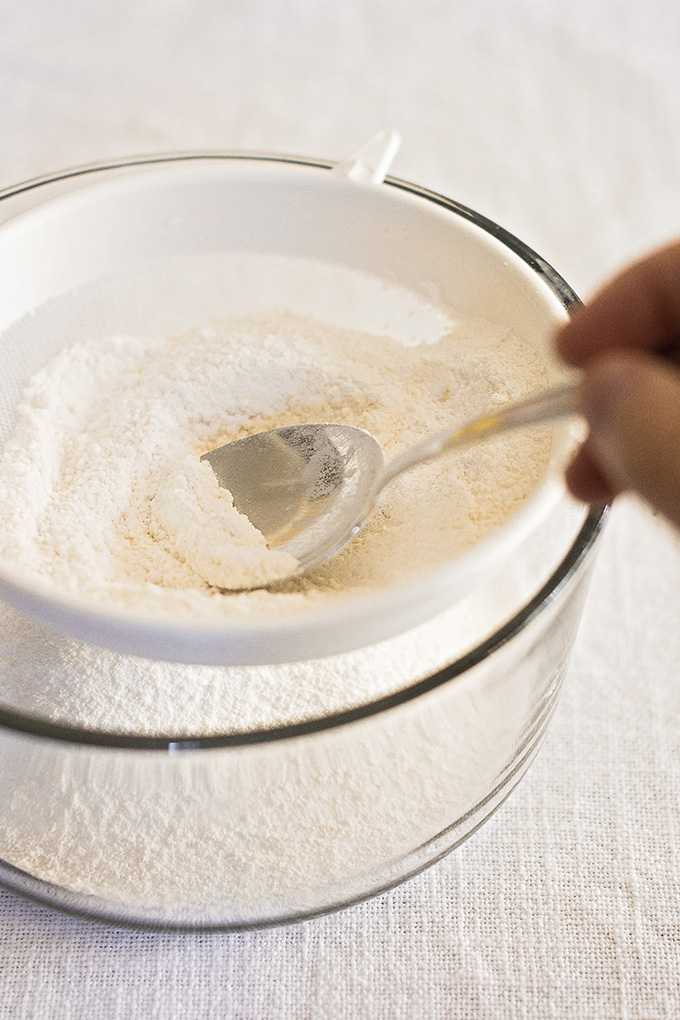 Sifting icing sugar and almond flour for French macarons